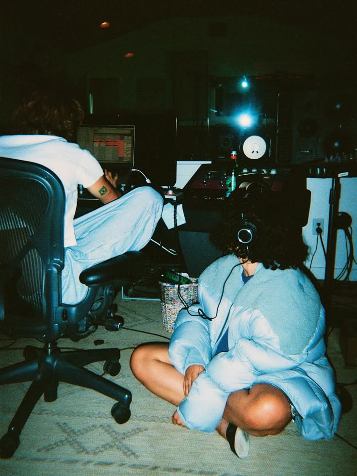 creatives at work in a studio at night